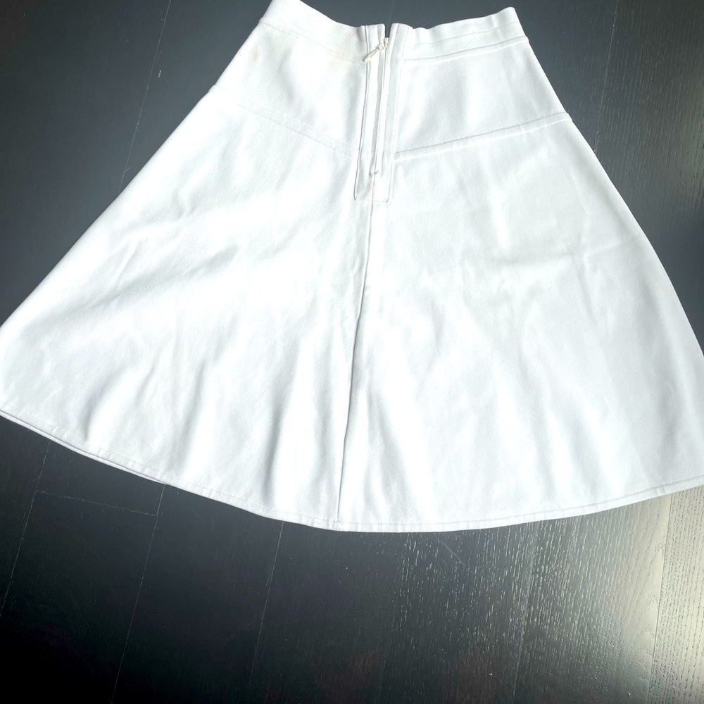 Flared white skirt..